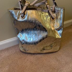 Like new gold Michael Kors bag